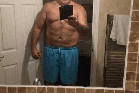 John Fury, 57, shows off bulking abs in bathroom selfie after training with son Tyson ahead of..