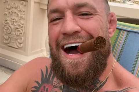 Fans baffled as Conor McGregor shares bizarre three-second clip of him laughing topless with an..