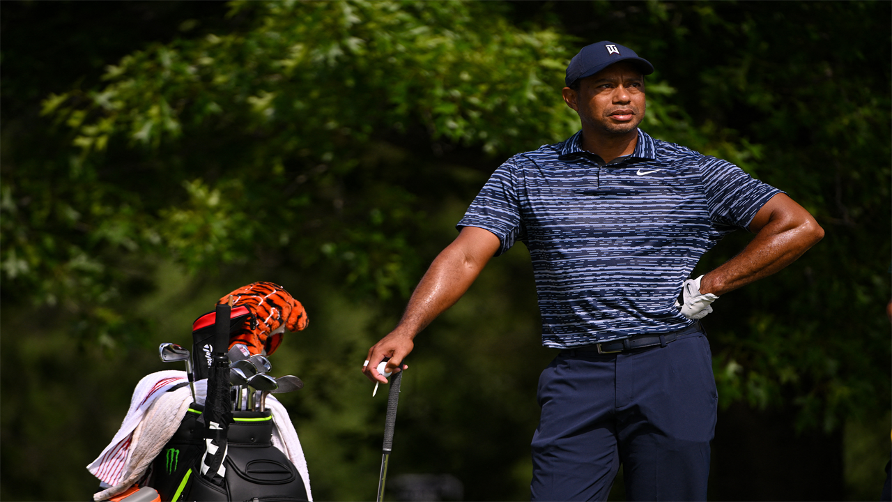 Tiger Woods almost hit by golf ball and has row with cameraman in eventful first round at PGA Championship