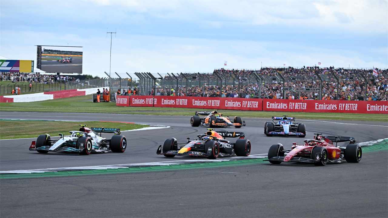 Why do F1 drivers zig-zag the car around the track?