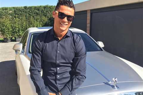 Wantaway Man Utd star Cristiano Ronaldo’s £600k Rolls-Royce Ghost clamped in Lisbon near shopping..