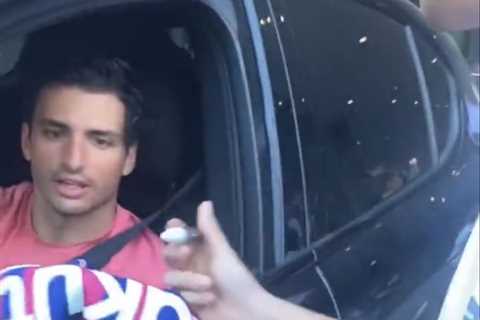 Watch Formula 1 star and huge Real Madrid fan Carlos Sainz fume after fan asks him to sign..