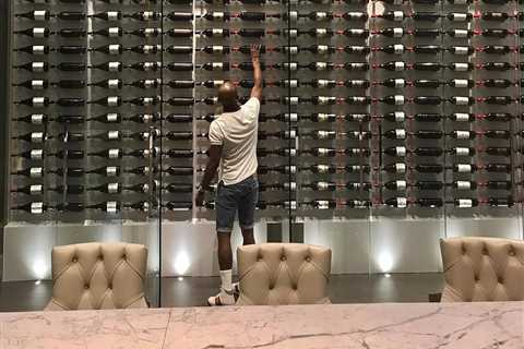 Boxing legend Floyd Mayweather boasts £19m LA mega mansion with stunning belt collection and..