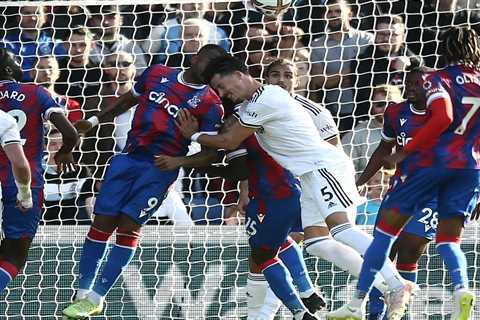 Crystal Palace ace Jordan Ayew plays on with five stitches and bloodied headband after sickening..