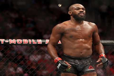 UFC star Jon Jones shows off incredible body transformation as he packs on extra 30lbs for..