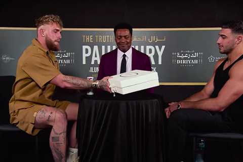 Watch Jake Paul hand Tommy Fury a gift for daughter Bambi after apologising for leaking baby’s..