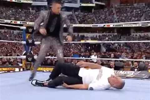 Snoop Dogg performs The Rock’s signature move as he steps in after Shane McMahon injury at..