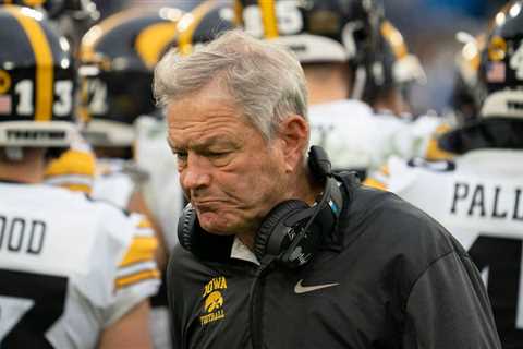 Iowa football coach 'greatly disappointed' in $4 million settlement of discrimination case