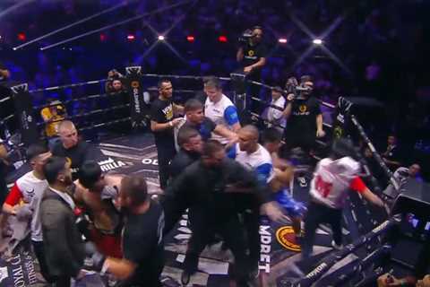 Watch moment shocking brawl breaks out AFTER MMA fight has ended as two teams throw kicks and..