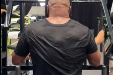 Mike Tyson, 58, flaunts intense NECK workouts and issues explicit warning to Jake Paul