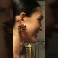 The fittings before the FerrariSS25 Fashion Show.