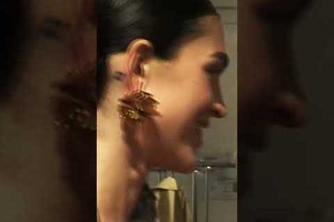 The fittings before the FerrariSS25 Fashion Show.